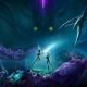 Two deep sea divers exploring vast ocean
