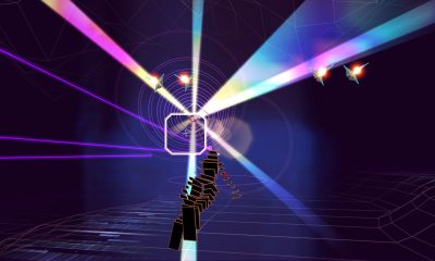 Running through neon colored lights in On-Rails Shooter Rez Infinite.