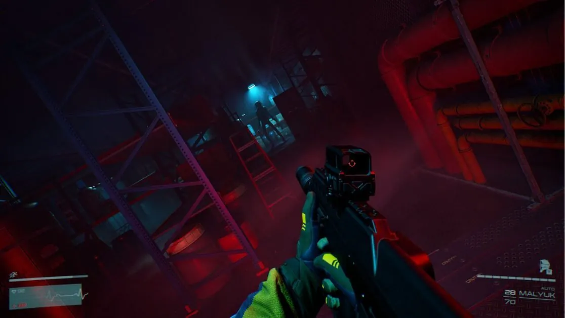 First-person view in a dark warehouse with a gun equipped