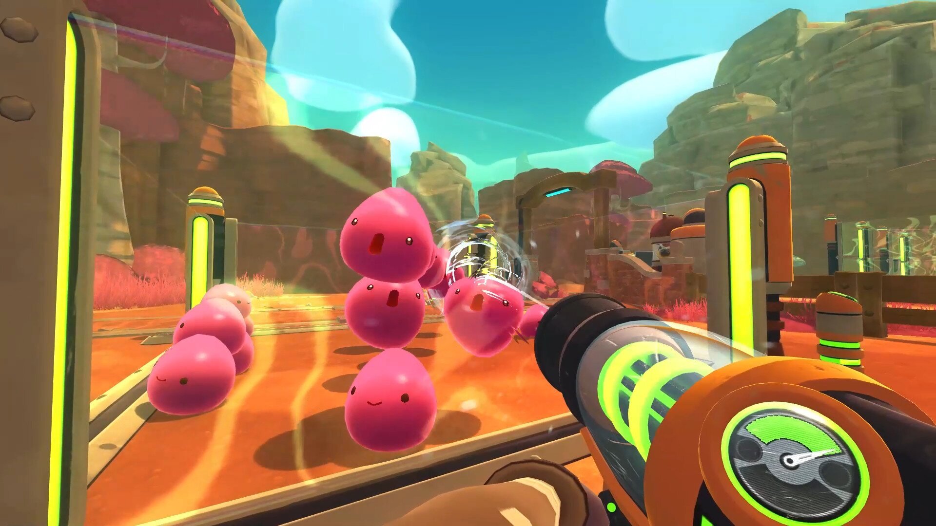 Player collecting pink slimes with a vacuum in beginner-friendly PC game