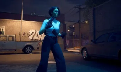 Armed character standing in a dark area