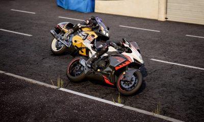 Two motorcyclists race side-by-side on a track in Steam's best racing game
