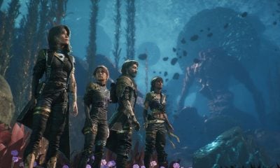 Underwater party scene with four heroes and a giant creature in a Game Pass RPG