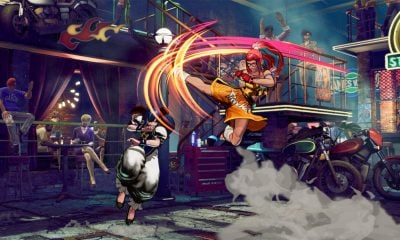 1v1 Xbox fighting game scene with two female fighters battling in a neon-lit bar