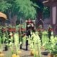 Một nhân vật chăm sóc một khu vườn tươi tốt đầy rau và trái cây trong trò chơi Steam miễn phí