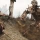 Warriors battle a massive tree-like monster in a PS Plus survival game scene
