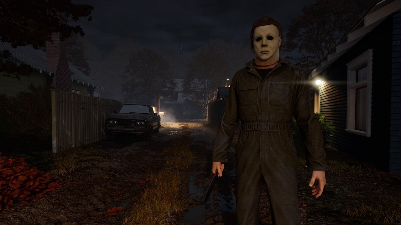 The Halloween game masked killer walks with a knife in a dark alley