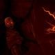 A monstrous figure with glowing eyes and sharp teeth emerges in horror mobile game