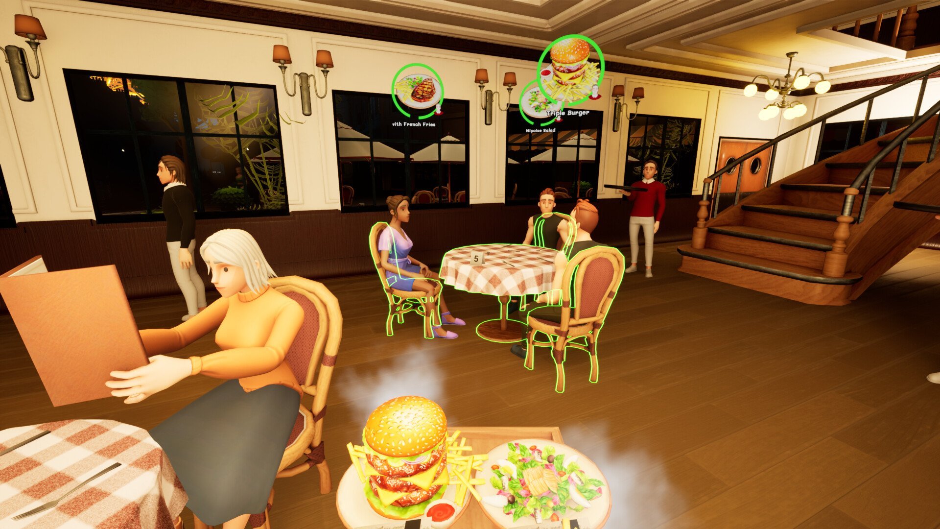 Waiter serving burger and salad to guests
