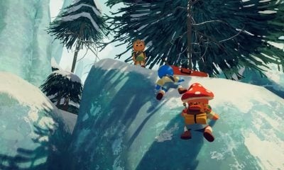 Cartoonish adventurers climb an icy cliff in Steam multiplayer game