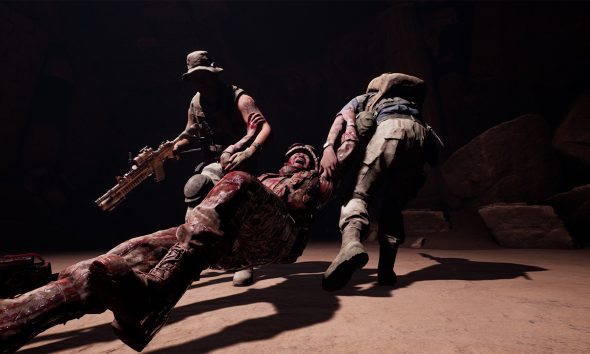 Two soldiers drag a badly injured comrade to safety