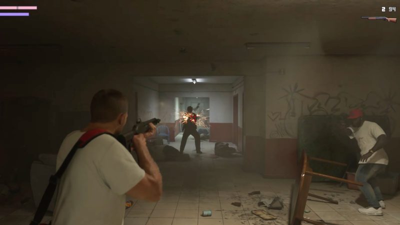 Jason fires a shotgun down a damaged hallway during an intense shootout