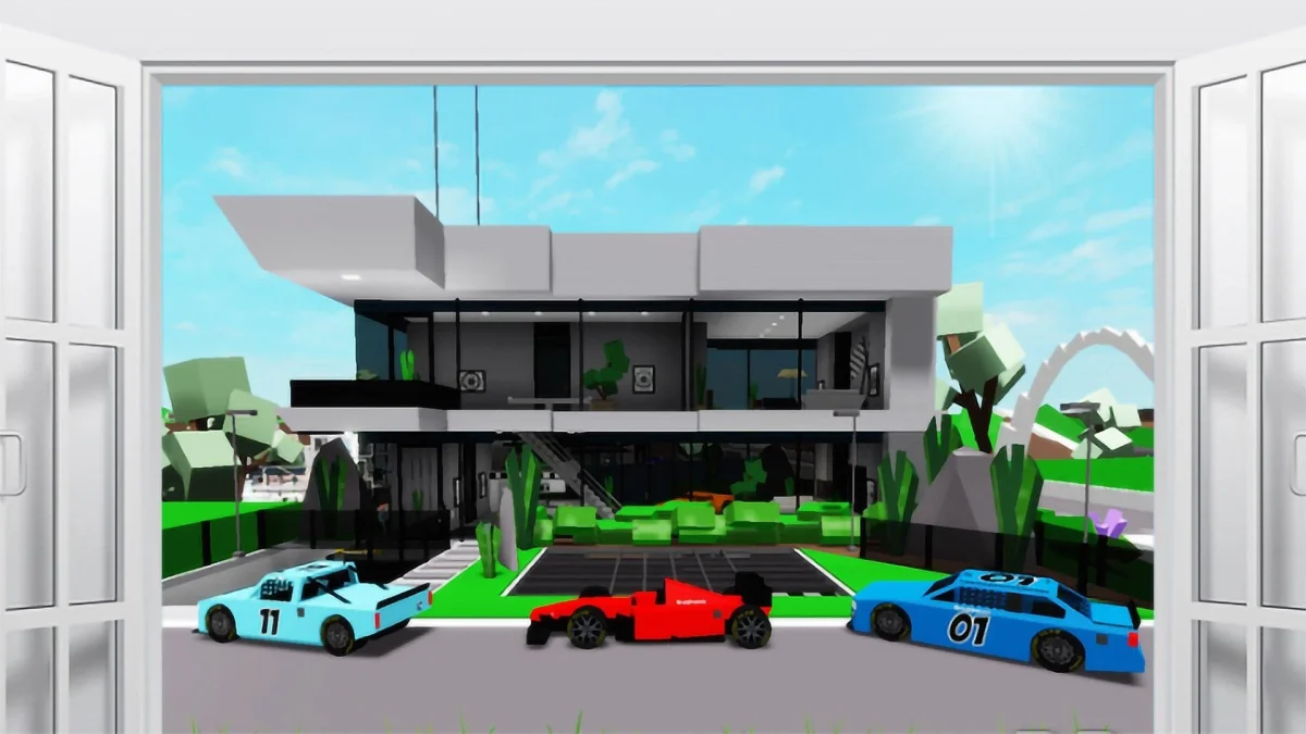 Large modern penthouse with several sports cars on driveway