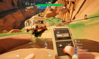 Players use a winch remote to pull an RV through rocky terrain in the friendslop PC game