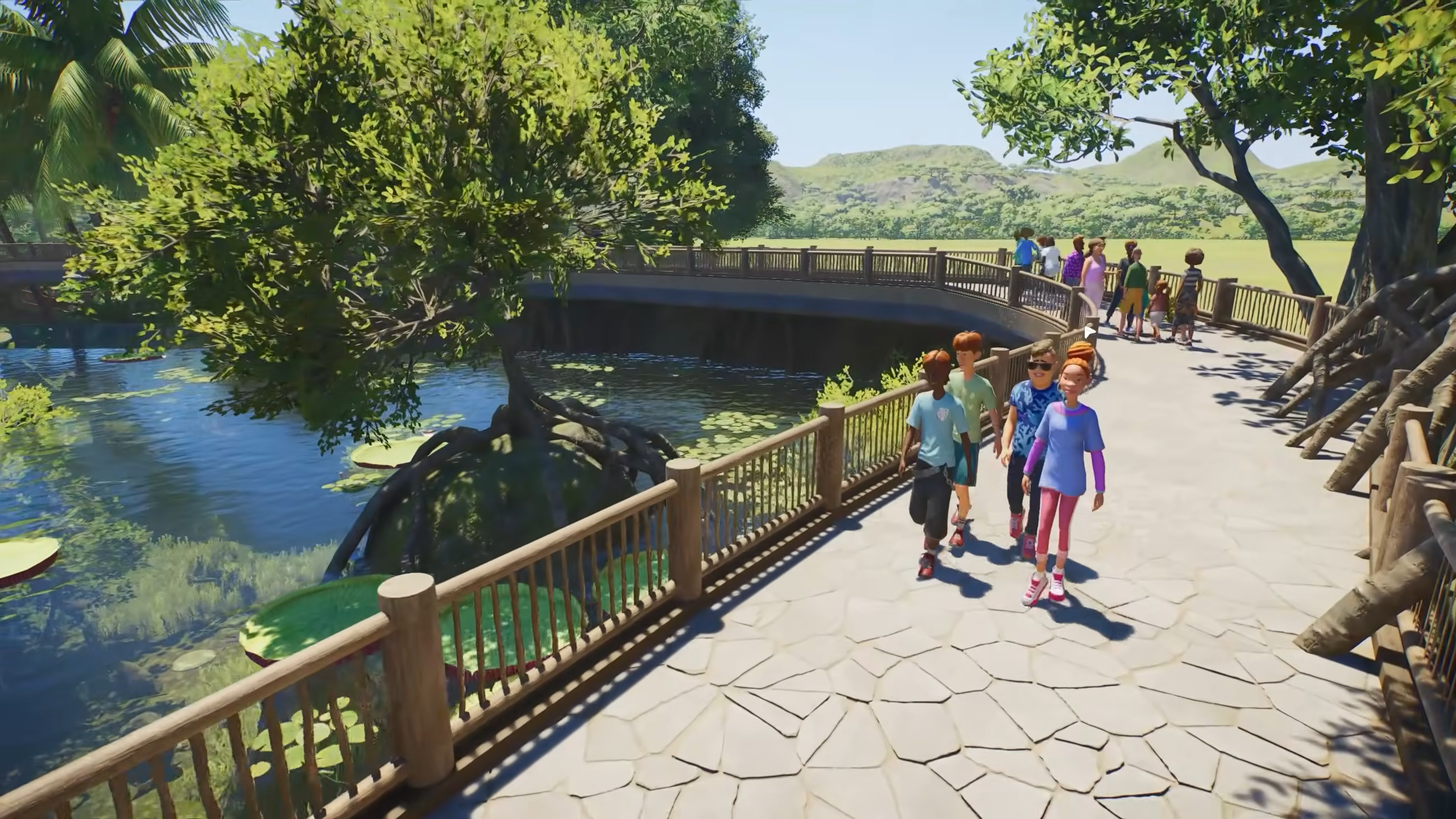 people walking around a zoo