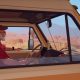Alfred drives his camper van through a sunlit desert in Forever Ago.