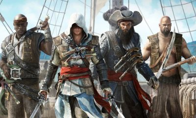 Assassin&rsquo;s Creed protagonists stand together on the deck of a sailing ship.