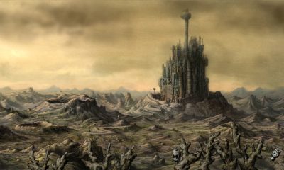 A tall mechanical tower rises above an industrial wasteland in Machinarium.