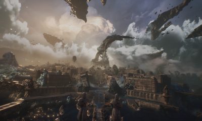 A fantastical city and distant mountains spread beneath dramatic clouds in Clair Obscur: Expedition 33.