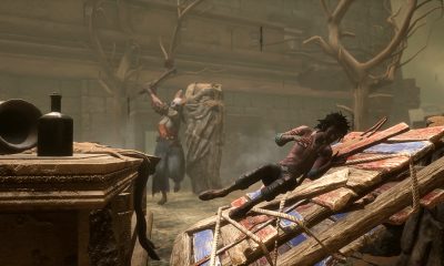 A ritual structure stands in a foggy forest in Dead by Daylight.