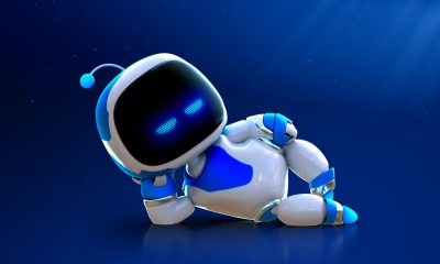 Astro, a small white and blue robot, poses against a deep blue background.