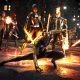 Marvel heroes including Magik stand ready for battle in a dark city setting from Marvel’s Midnight Suns.