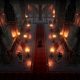 Candlelight illuminates a red-carpeted hall inside a stone castle in V Rising.