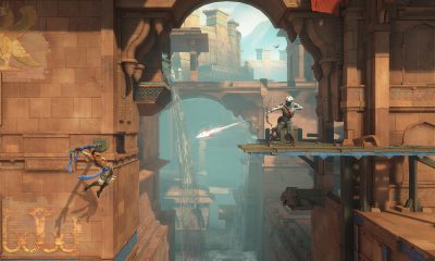 Sargon crosses a vast ancient temple chamber in Prince of Persia: The Lost Crown.