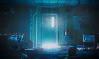 Blue light shining through a damaged offshore room in Still Wakes the Deep.