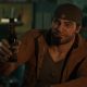 Young Marcus Fenix raises a bottle in a Gears of War: E-Day campaign screenshot.