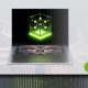 Laptop with a glowing green AI graphic on screen above an exposed chip layout