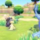 Pokémon face each other on grassy terraces surrounded by fruit trees in Pokémon Pokopia.