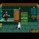 The protagonist faces a screaming creature in a green tiled bathroom in Tenebris Somnia.